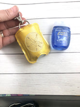 Sand Dollar Hand Sanitizer Holder Snap Tab In the Hoop Embroidery Project