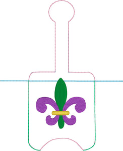 Fleur De Lis Hand Sanitizer Holder Snap Tab en el proyecto de bordado de aro