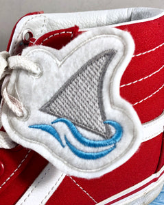 Diseño de bordado de alas de zapato de aleta de tiburón