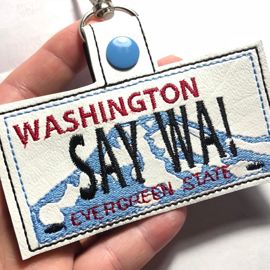 Pestaña a presión para bordado de placa de Washington