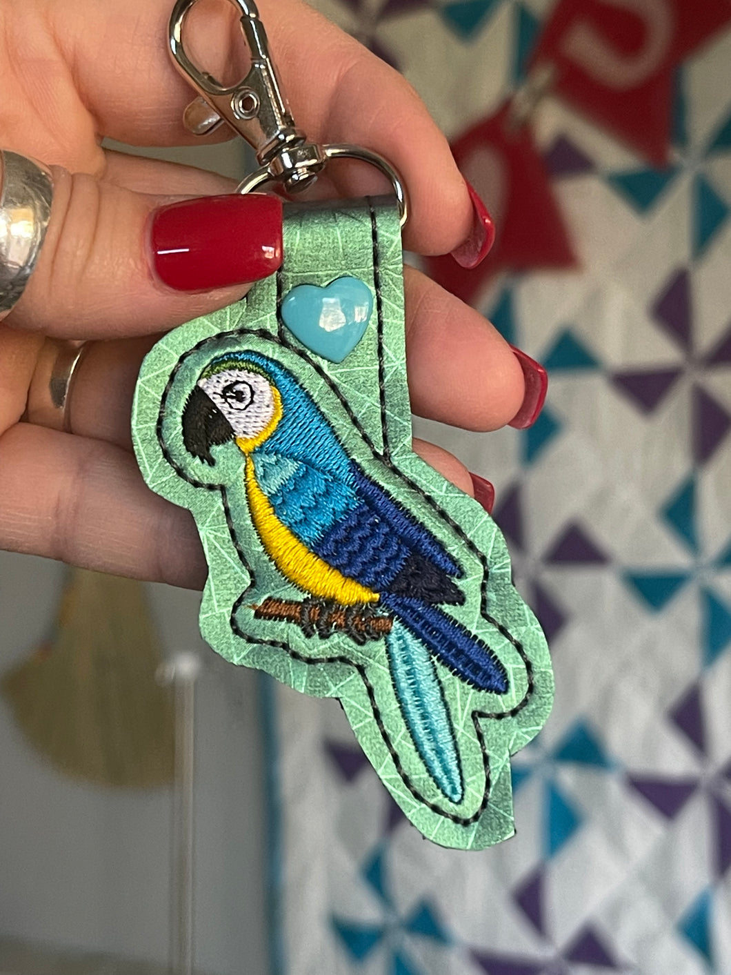 Blue Macaw Parrot Snap Tab In the Hoop embroidery design