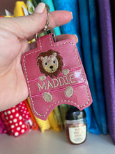 Split Lion Hand Sanitizer Holder Snap Tab Version In the Hoop Embroidery Project 1 oz for 5x7 hoops