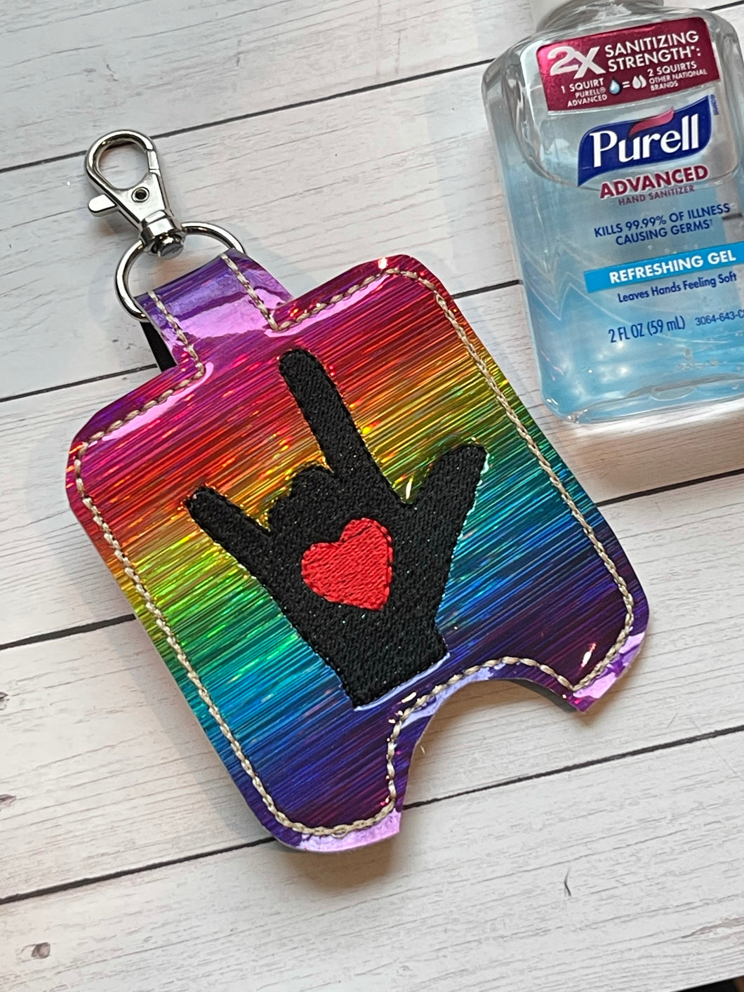 ILY Sign Language Hand Sanitizer Holder for 2 oz Bottles Snap Tab In the Hoop Embroidery Project