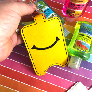 NEW SIZE Smile Hand Sanitizer Holder Snap Tab Version In the Hoop Embroidery Project 3 oz DT for 5x7 hoops