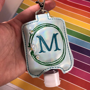 Rain Lily Monogram Frame Hand Sanitizer Holder for 2 oz Bottles Snap Tab In the Hoop Embroidery Project